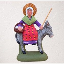 Femme sur l'âne